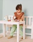 Ensemble table et canapé de jardin blanc