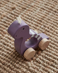 Dino à pousser violet NEO