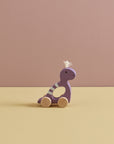 Dino à pousser violet NEO