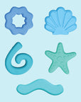 Fillers en silicone bleus Glo Pals, coquillage, étoile de mer, vague et spirale à faire flotter dans le bocal