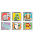 Six cubes lumineux Zany Zoo de Glo Pals sur fond blanc, illustrés d’un zèbre, d’un serpent, d’un singe, d’un éléphant, d’un panda et d’un lion.